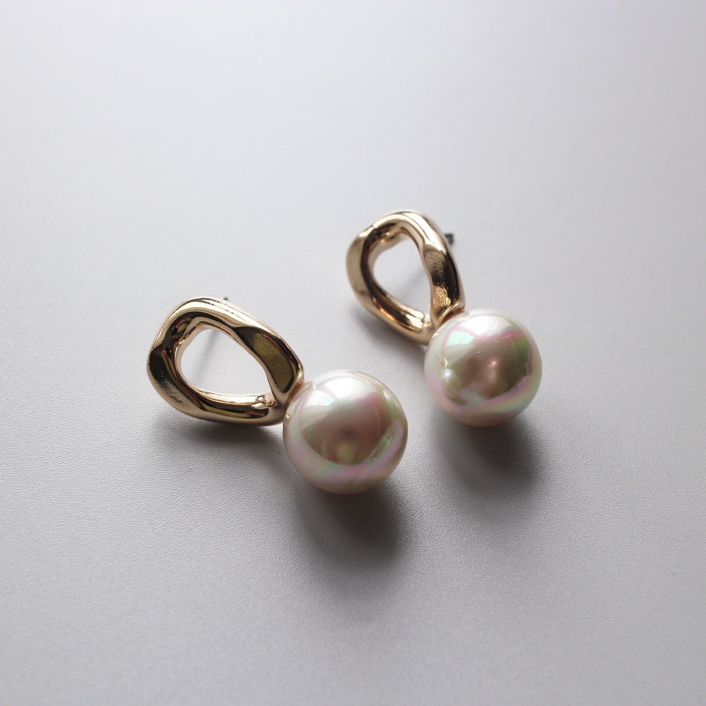 Oval Metal Pearl Pierce