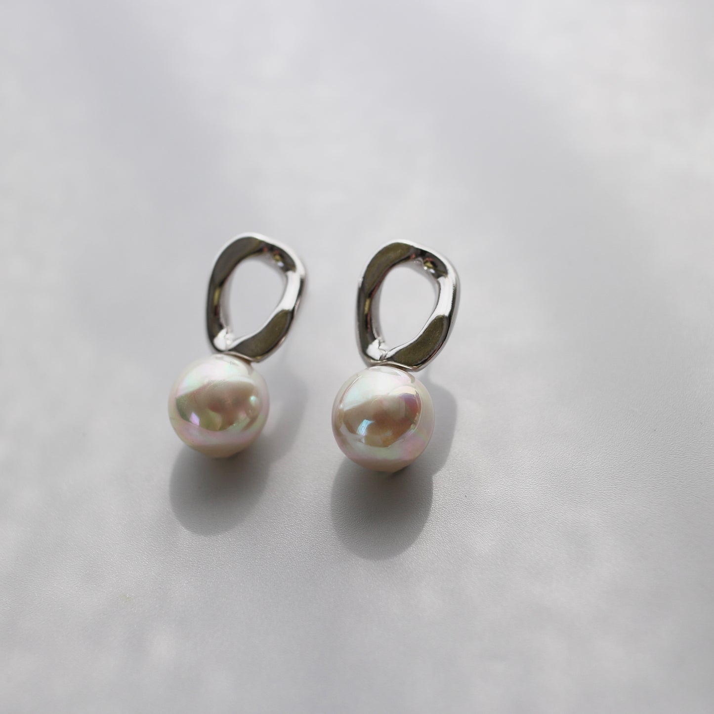 Oval Metal Pearl Pierce