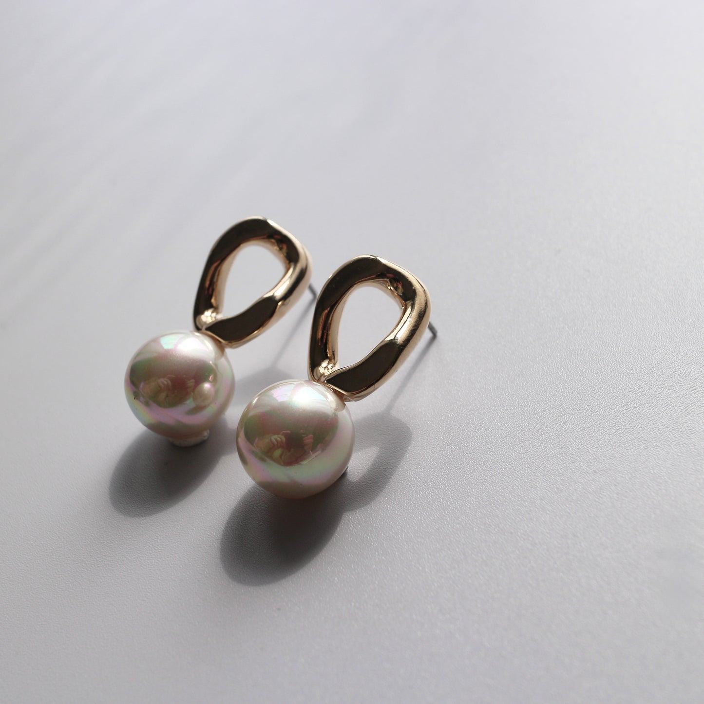 Oval Metal Pearl Pierce